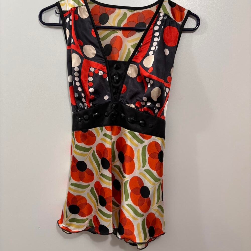 Multi patterned indie tank top features
